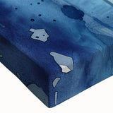 Close-up view of a vibrant stretched canvas wall art featuring an orca whale design, showcasing detailed marine life colors on a textured surface, perfect for ocean-themed decor.
