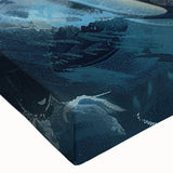Close-up of a vibrant stretched canvas wall art featuring a detailed orca design, showcasing marine life colors and textures, perfect for ocean-themed decor.