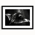 Framed wall art featuring a stunning marine life ray design in black and white, set against a sleek black frame with a mat, perfect for coastal decor enthusiasts.