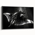 Framed canvas wall art showcasing a vibrant marine life ray design, set against a sleek black frame, ideal for coastal-themed decor.