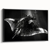Framed canvas wall art showcasing a vibrant marine life ray design, set against a sleek black frame, ideal for coastal-themed decor.