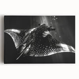 Stretched canvas wall art showcasing a vibrant marine life ray design, featuring shades of blue and green, ideal for ocean-themed decor in homes or offices.