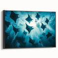 Framed wall art canvas showcasing a vibrant marine life ray design, featuring rich blue and green colors with a sleek black frame, perfect for ocean-themed decor.