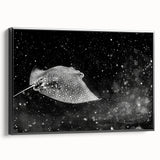 Framed canvas wall art featuring a vibrant marine life ray design, showcasing intricate colors and details, presented in a sleek black frame, side view.