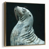 Framed wall art featuring a vibrant sea lion design against a gold background, showcasing marine life in a stylish and modern setting, perfect for ocean-themed decor.