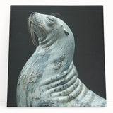 Vibrant stretched canvas wall art featuring a playful sea lion design, showcasing intricate marine life details with a blue and aqua color palette, perfect for ocean-themed decor.