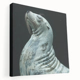 Side view of a stretched canvas wall art featuring a vibrant sea lion design against a blue ocean background, perfect for marine life enthusiasts and home decor.