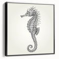 Framed canvas wall art showcasing a detailed black seahorse design, perfect for marine life enthusiasts. Ideal for home decor or coastal-themed spaces.