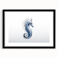 Black-framed wall art featuring a vibrant marine life seahorse design, ideal for ocean-themed decor, showcasing intricate details and colors. Perfect for enhancing home aesthetics.