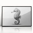Framed wall art featuring a vibrant marine life seahorse design, showcasing intricate details and a sleek black frame, perfect for ocean-themed decor. Ideal for enhancing living spaces with a touch of nature-inspired elegance.