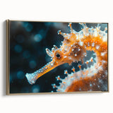 Framed canvas wall art showcasing a vibrant gold seahorse design, elegantly displayed in a modern setting, perfect for marine-themed home decor.