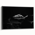Framed canvas wall art featuring a striking shark design in a marine life theme, presented in a sleek black frame, ideal for ocean-inspired decor.