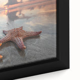 Close-up of a framed canvas art piece showcasing a vibrant starfish design, featuring rich colors and intricate details that celebrate marine life, perfect for coastal decor.