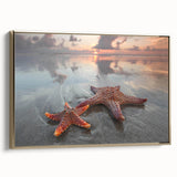 Framed canvas wall art featuring a vibrant marine life design with a starfish motif, elegantly displayed with a gold frame, perfect for coastal decor.