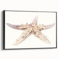 Framed canvas wall art showcasing a marine life starfish design, featuring vibrant colors and a sleek black frame, perfect for coastal-themed decor.