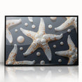 Framed wall art featuring a marine life starfish design in vibrant colors, set against a sleek black frame, perfect for ocean-themed home decor.