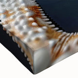 Close-up of a vibrant starfish design on a stretched canvas, showcasing intricate details and bright colors, perfect for marine life-themed home decor.