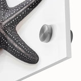 Close-up of a vibrant marine life-themed wall art piece featuring a detailed starfish design, showcasing intricate textures and bold colors on acrylic glass.