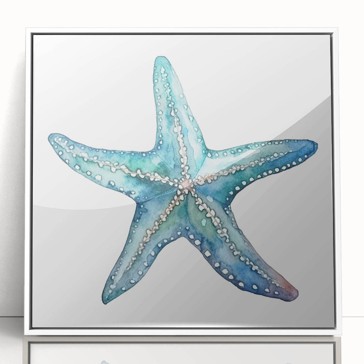 Framed wall art featuring a vibrant starfish design in an acrylic finish, set against a white background, perfect for marine life enthusiasts and coastal decor.