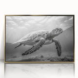 Framed wall art featuring an intricate marine life design with a turtle motif, set in a gold-acrylic frame, perfect for ocean-themed decor.