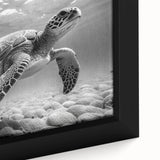 Close-up of a framed canvas wall art featuring a vibrant marine life design, showcasing a turtle surrounded by colorful coral and ocean elements, perfect for ocean-themed decor.