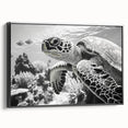 Framed wall art featuring a vibrant marine life design with a sea turtle, showcased in a sleek black frame, perfect for ocean-themed decor.