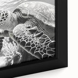 Close-up of a vibrant marine life wall art piece featuring a detailed turtle design, framed in a sleek black frame, perfect for ocean-themed decor.