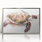Framed wall art featuring a vibrant marine life design with a turtle, set in a sleek silver frame, showcasing intricate details and colors, perfect for ocean-themed decor.