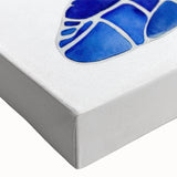 Close-up of a vibrant turtle design on stretched canvas wall art, showcasing intricate marine life details and vivid colors, perfect for ocean-themed decor.