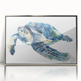 Framed wall art showcasing a vibrant marine life turtle design in acrylic with a sleek silver frame, ideal for ocean-themed decor and nature lovers.