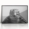 Framed wall art showcasing a vibrant marine life design featuring a turtle, presented in a sleek black frame, ideal for ocean-themed decor enthusiasts.