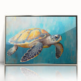 Framed wall art featuring a vibrant marine life design with a turtle, displayed in a sleek silver frame, ideal for ocean-themed home decor.