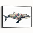 Framed canvas wall art featuring a detailed marine life design, showcasing a majestic whale in shades of blue and white, with a sleek black frame, perfect for ocean-themed decor.