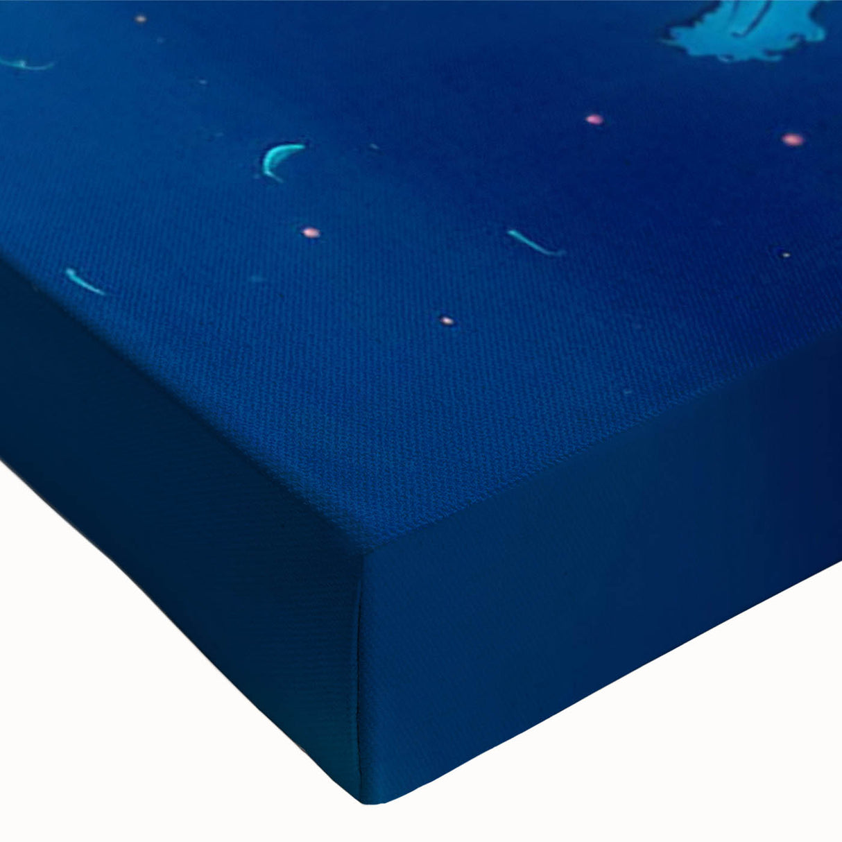 Close-up of a stretched canvas wall art featuring a vibrant marine life design, showcasing a majestic whale against a soothing blue ocean background, perfect for ocean-themed decor.