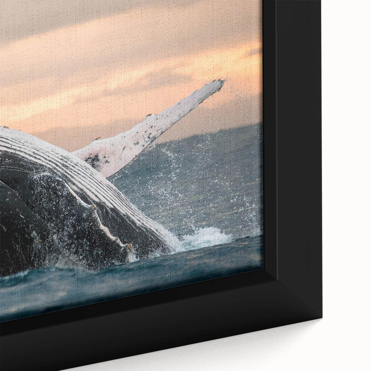 Close-up of a framed canvas wall art piece showcasing a vibrant whale design, featuring intricate marine life details in shades of blue and green, ideal for ocean-themed decor.