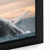 Close-up of a framed canvas wall art piece showcasing a vibrant whale design, featuring intricate marine life details in shades of blue and green, ideal for ocean-themed decor.