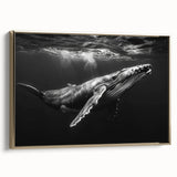 Framed canvas wall art showcasing a side view of a marine life whale design, featuring rich blue tones and gold accents, perfect for ocean-themed decor.