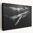 Stretched canvas wall art showcasing a vibrant marine life design featuring a majestic whale in a side view. Perfect for ocean-themed decor, this artwork brings a touch of the sea into any room with its vivid colors and detailed illustration. Ideal for marine enthusiasts and eco-conscious homes.