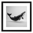 Framed wall art collection featuring a striking black mat and marine life whale design, ideal for ocean-themed decor, showcasing intricate details and vibrant colors.