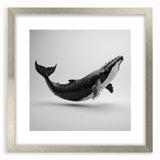 Framed wall art showcasing a stunning marine life design featuring a whale, with a sleek silver frame and elegant mat, perfect for coastal-themed decor.