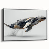 Framed canvas wall art featuring a beautifully illustrated whale design in shades of blue and gray, set against a sleek black frame, perfect for marine life enthusiasts.