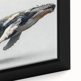 Close-up of a framed canvas wall art piece showcasing a detailed marine life design featuring a majestic whale, against a serene blue background, perfect for ocean-themed decor.