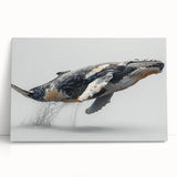 Stretched canvas wall art featuring a vibrant whale design in shades of blue and green, elegantly leaning against a white wall, perfect for marine-themed decor.