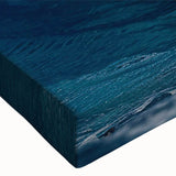 Close-up of a vibrant stretched canvas wall art piece featuring a colorful whale design, showcasing intricate details and textures, perfect for marine life enthusiasts.