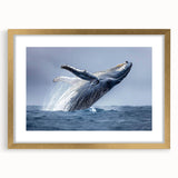 Elegant marine life wall art featuring a striking whale design in a gold frame with matting, perfect for ocean-themed decor or as a statement piece in any room.
