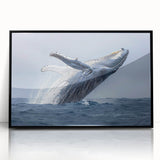Framed wall art collection featuring a stunning whale design in vibrant blue tones, set against a sleek black frame, perfect for marine life enthusiasts.