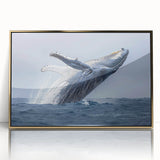 Framed acrylic wall art featuring a striking marine life design with a majestic whale, accented by a gold frame, ideal for ocean-themed decor.