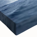 Close-up of a vibrant marine life whale design on stretched canvas wall art, showcasing intricate details and colors that evoke oceanic beauty. Perfect for enhancing coastal-themed decor.