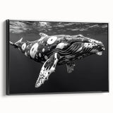Framed canvas wall art showcasing a stunning whale design in a marine life theme, featuring a black frame for an elegant side view display, perfect for ocean lovers.