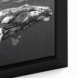 Close-up of a framed canvas wall art piece showcasing a detailed marine life design featuring a majestic whale, vibrant blue hues, and intricate textures, perfect for ocean-themed decor.